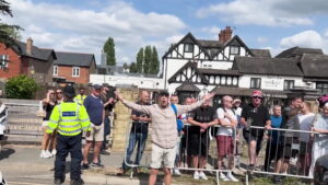 UK vows to speed up asylum claims as protests spread